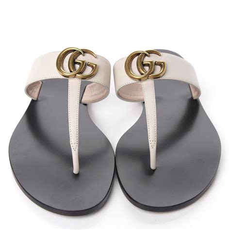 Shop Gucci Marmont GG Leather Thong Sandals .